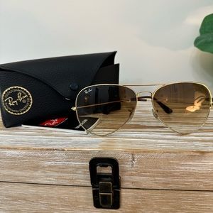 Ray-Ban gold frame aviator sunglasses with brown ombré lens.